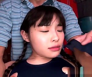 Tiny Japanese babe squirts all over self when her clit is stimulated